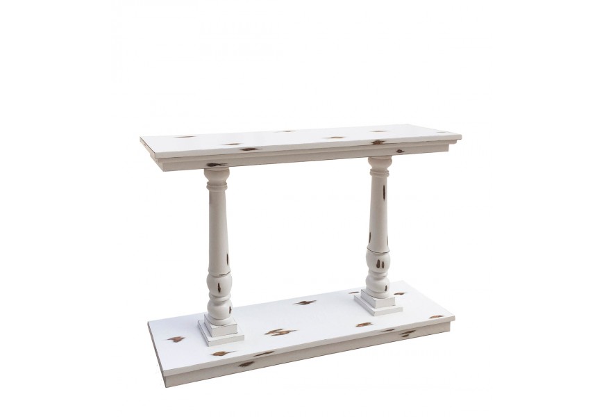 Vintage klasický konzolový stolík Bianca s bielym starožitným zámerne zošúchaným náterom z masívneho mindi dreva s dvomi ozdobne vyrezávanými nožičkami v tvare stĺpov a obdĺžnikovou podstavou